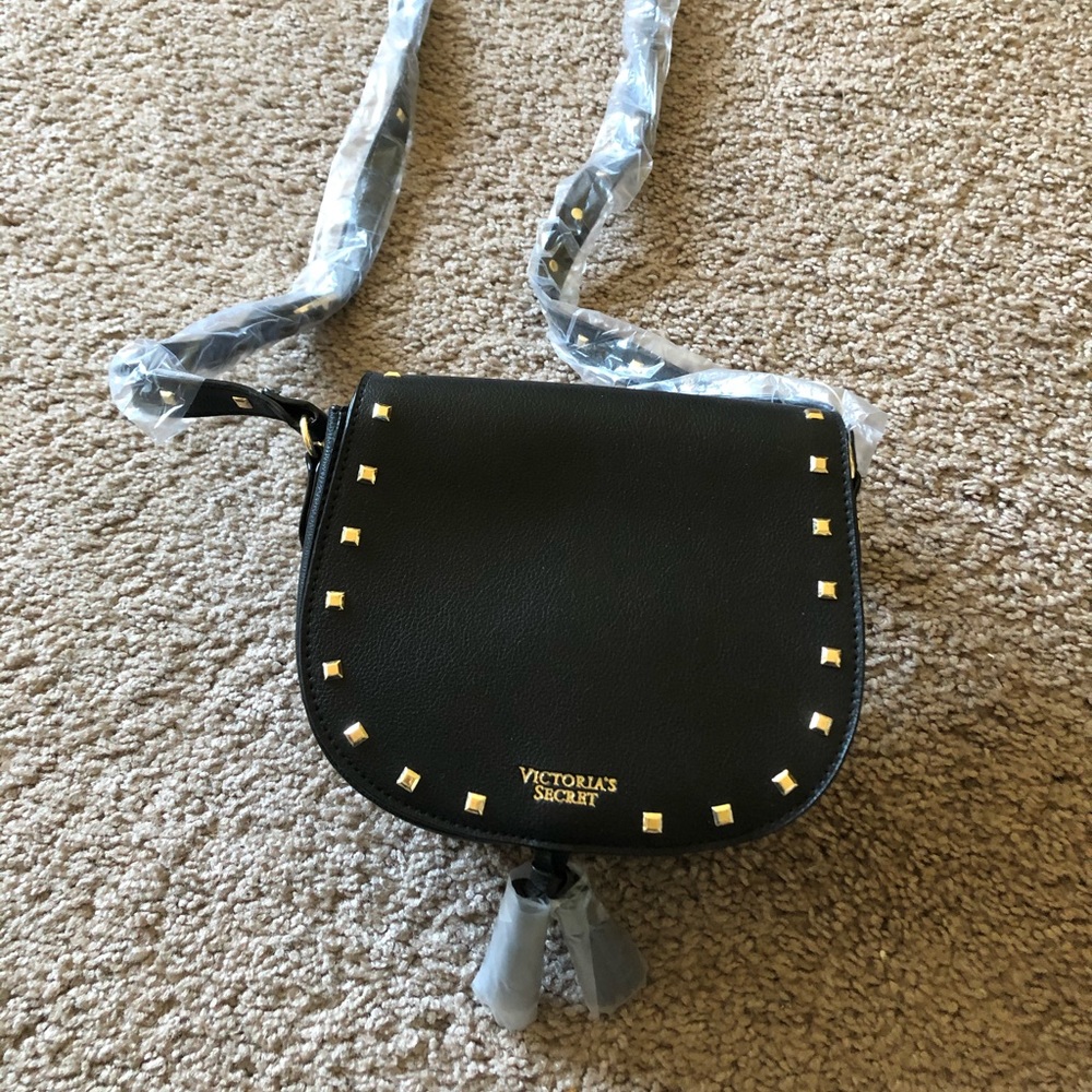 Victoria’s Secret crossbody saddle bag stud tassel